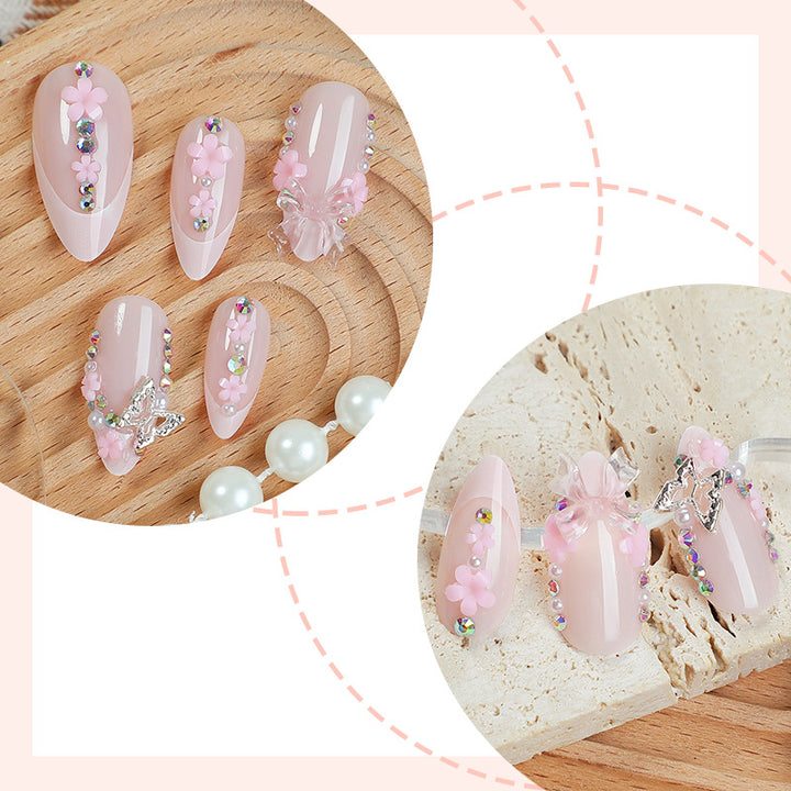 Kreatives Kunstnagelset mit verspielten Blüten- und Glitzerakzenten Karnz