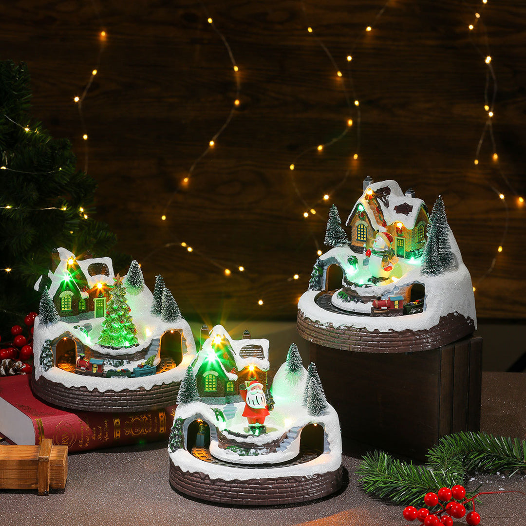 Beleuchtete Weihnachts-Schneekugel-Szene Karnz