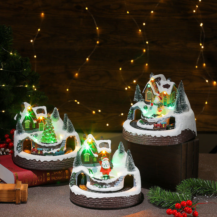 Beleuchtete Weihnachts-Schneekugel-Szene Karnz