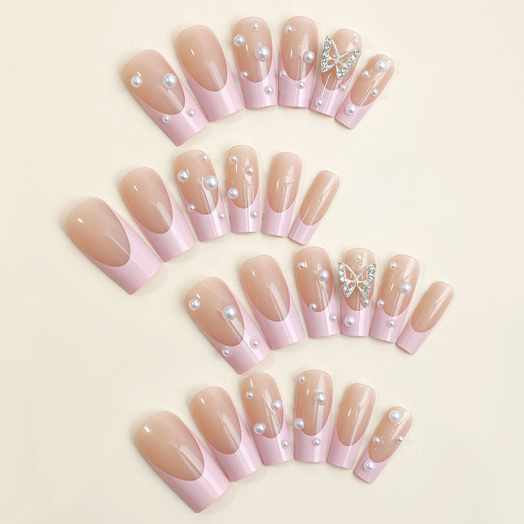 Kunstnagelset mit stilvollen 3D-Perlen- und Glitzerverzierungen Karnz