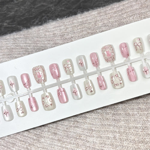 Künstlerisches Press-On Nagelset mit elegantem Stern Design