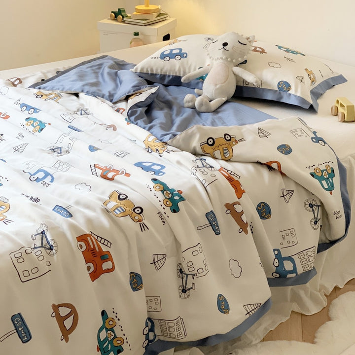 Kinder-Bettwäscheset aus Baumwollsatin mit verspieltem Safari-Tierprint und kontrastierter Saumkante
