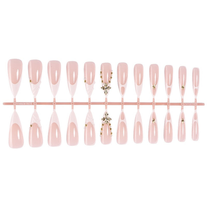 Elegantes künstliches Nagelset mit einzigartigen Verzierungen Karnz