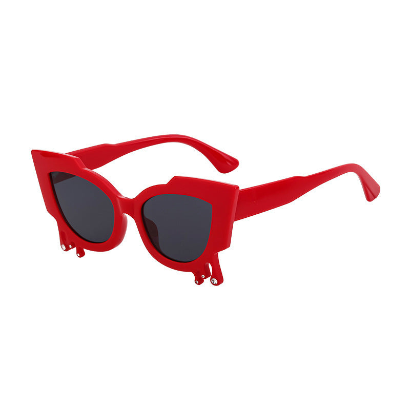 Damen Exklusive Katzenaugen-Sonnenbrille mit kunstvollen Details Karnz