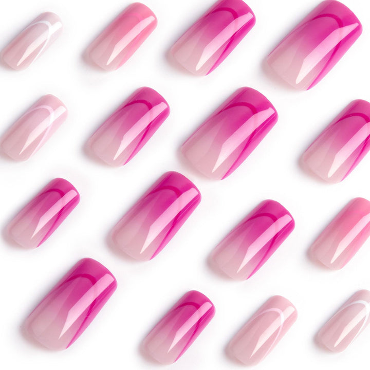 Kunstvolle Nagelverlängerungen mit eleganten Ombre-Effekten Karnz