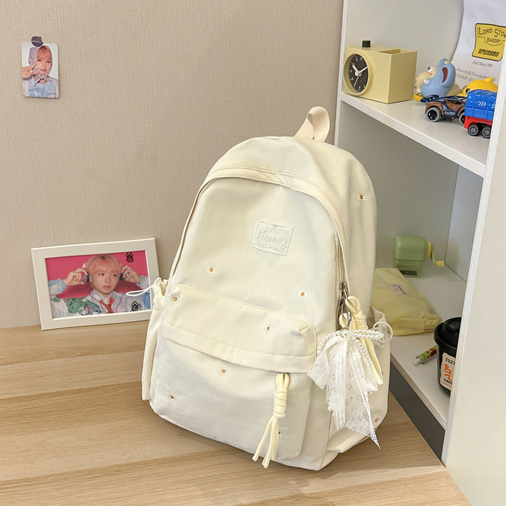 Stylischer backpack mit floralem Schmuck Karnz