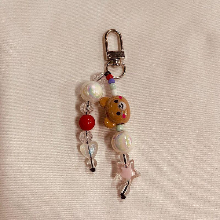 Dekorativer Charm-Handyband Karnz