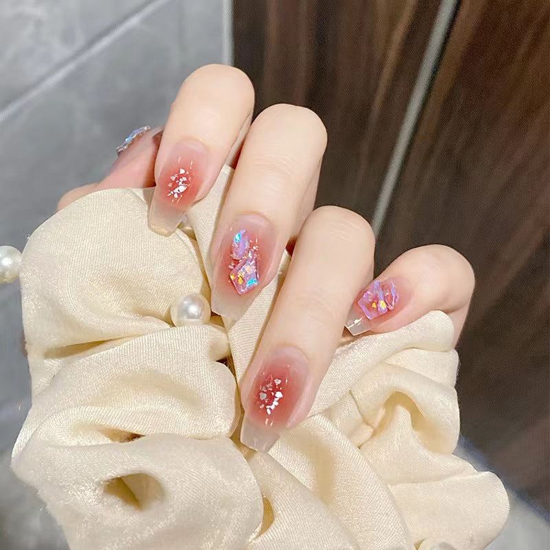 Kunstvolle Acryl-Nägel mit Glitzer-Elementen Karnz