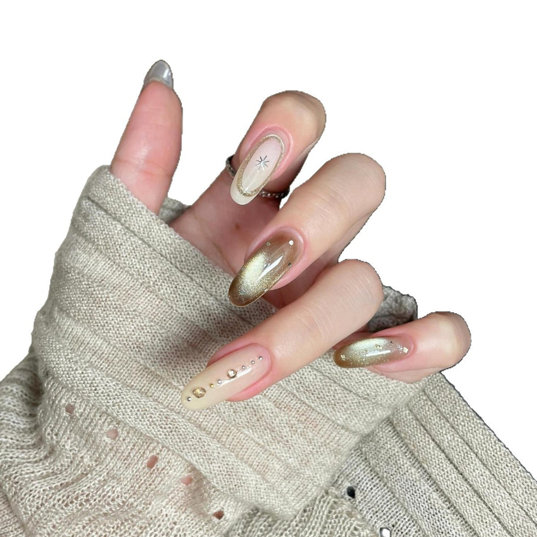 Kunstnägel mit Glitzer- und Sternendesign Karnz