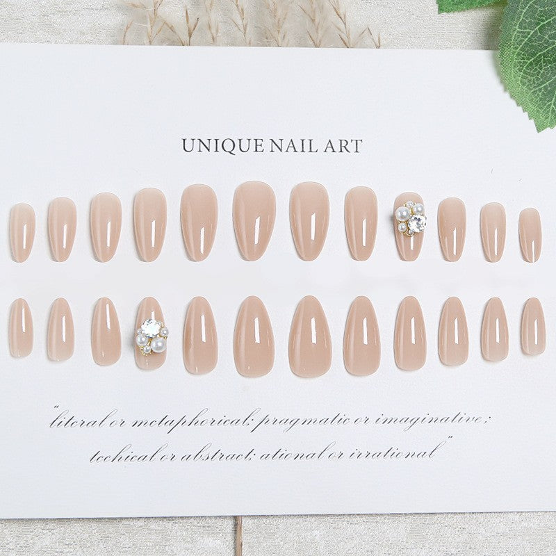 Kunstnagelset mit elegantem Perlendesign und hochglänzender Oberfläche Karnz