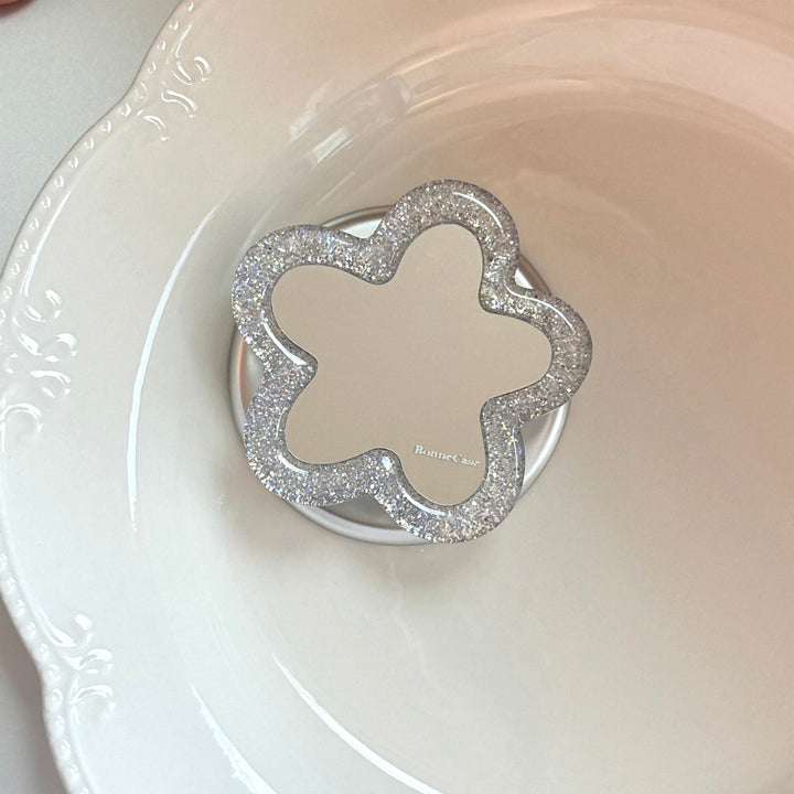 Glitzernder Blütenuntersetzer Karnz