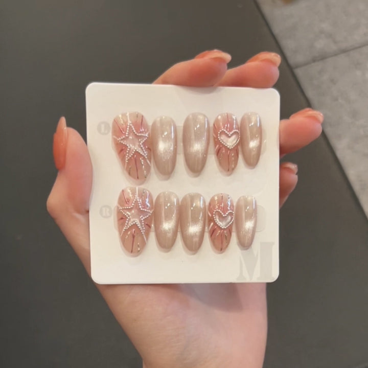 Modischer Press-On Nagelset mit glamourösen Stern- und Herzdesigns Karnz