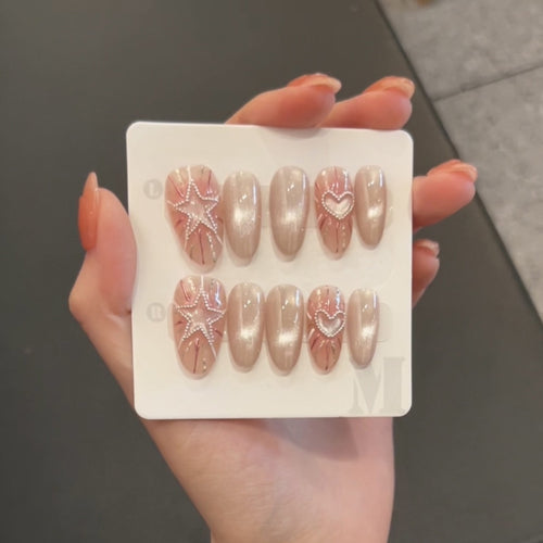 Modischer Press-On Nagelset mit glamourösen Stern- und Herzdesigns Karnz