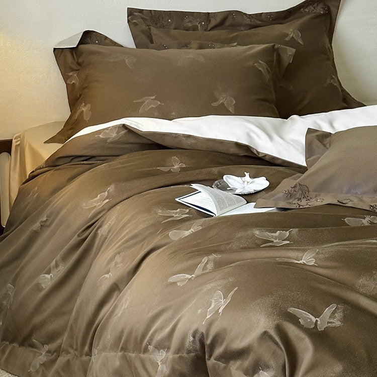 Elegantes fein gewebtes Bettwäsche-Set aus Mako‑Satin mit dezenter Schmetterlings‑Jacquardstruktur und Wendekissen