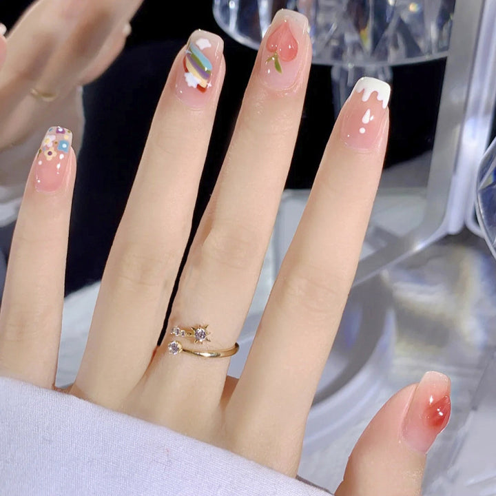 Kreatives Kunstnagelset mit bunten Fruchtmotiven und stilvollen Designs Karnz