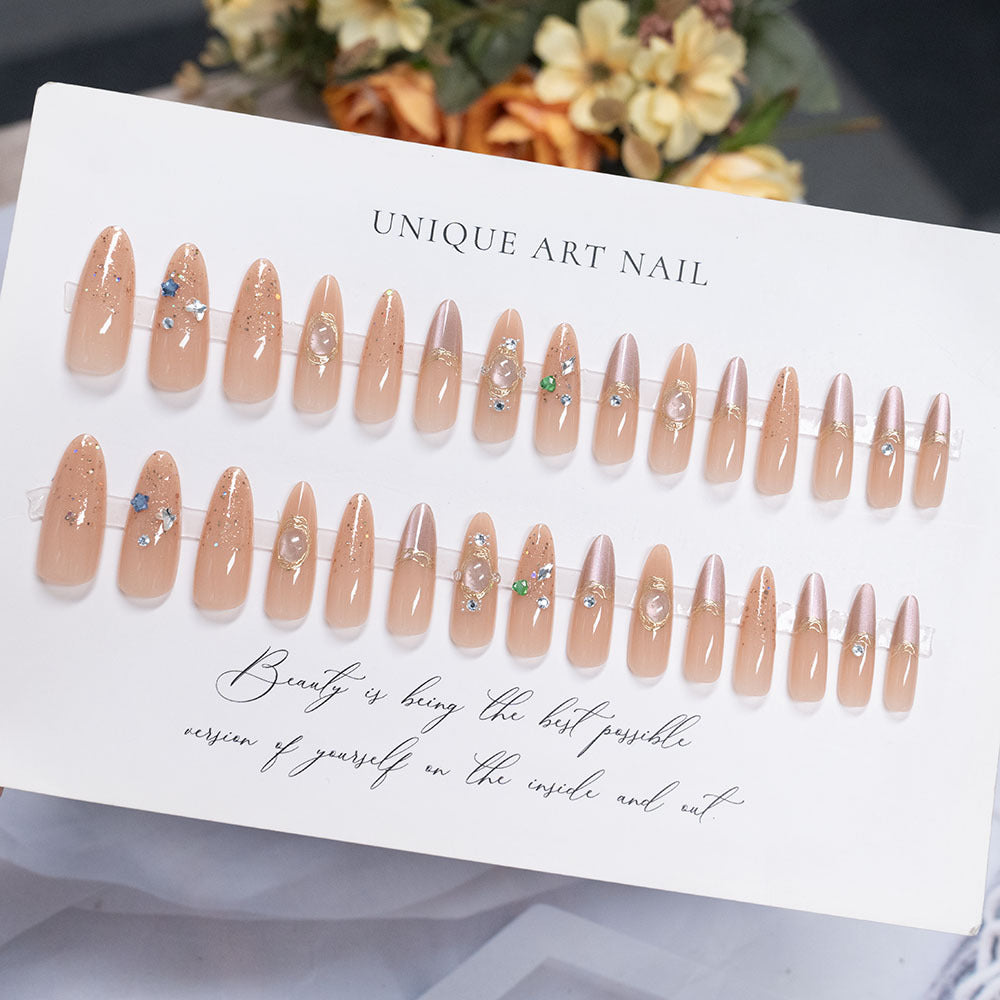 Dekorative Lange Stiletto Press-On Nägel mit Strass-Akzenten