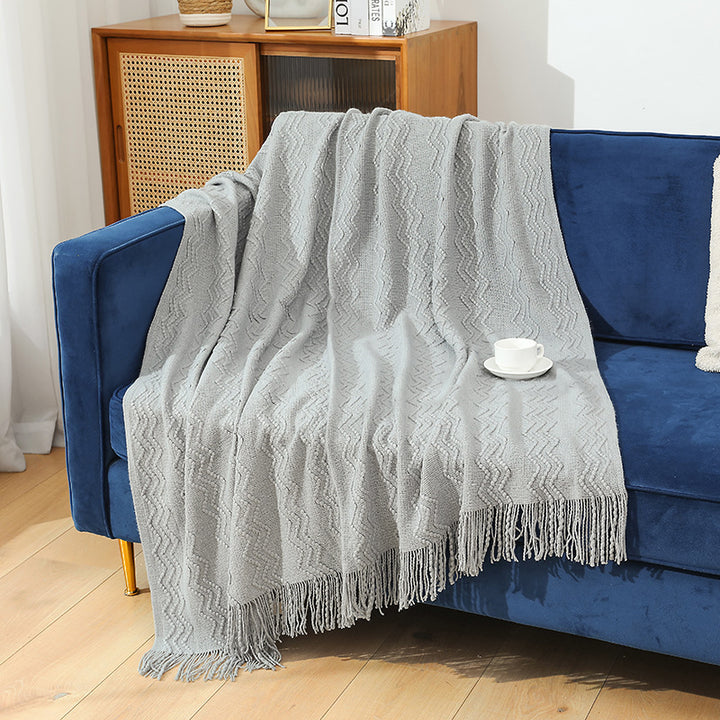 Gemütliche gestrickte Wurfdecke
