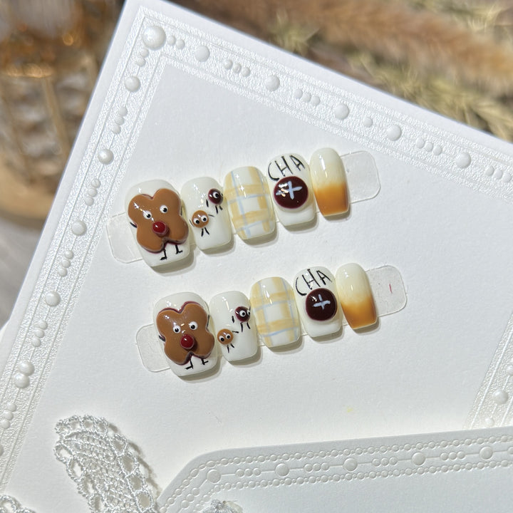 Verspieltes Lebkuchen Press-On Nagelkunst Set Karnz