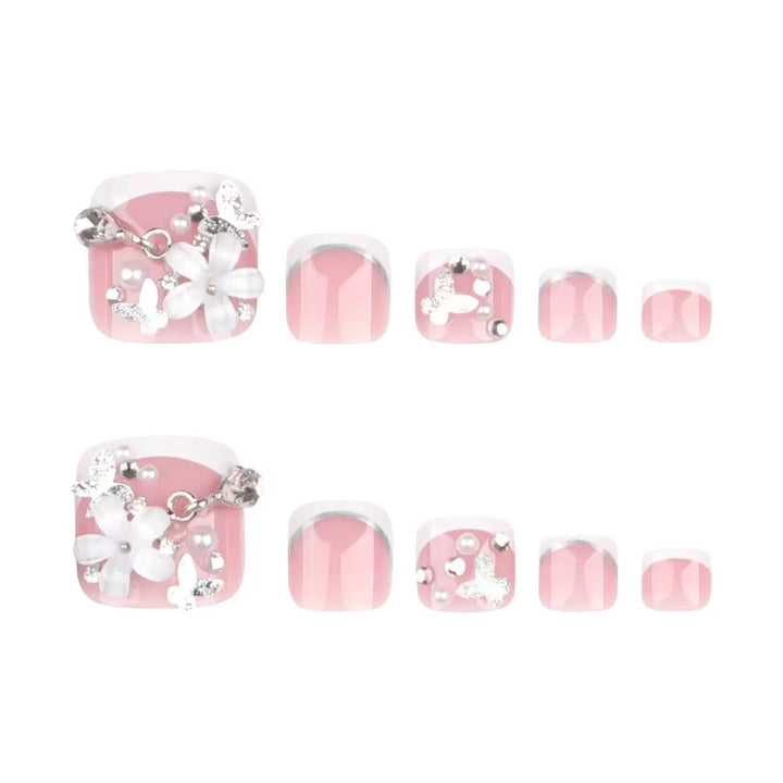 Kunstnagelset mit eleganten Blumenverzierungen und Hochglanz-Finish Karnz