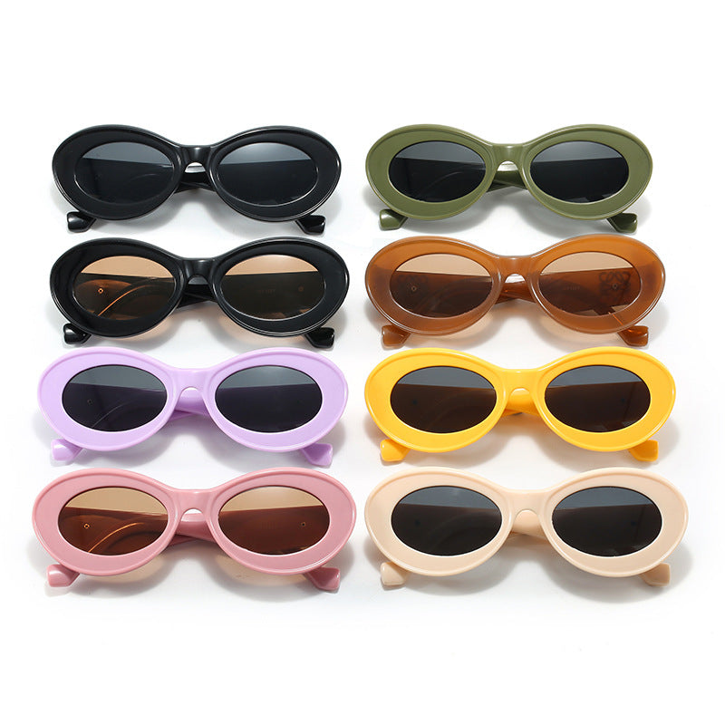 Damen modische Sonnenbrille mit ovalem Rahmen und goldenen Applikationen Karnz