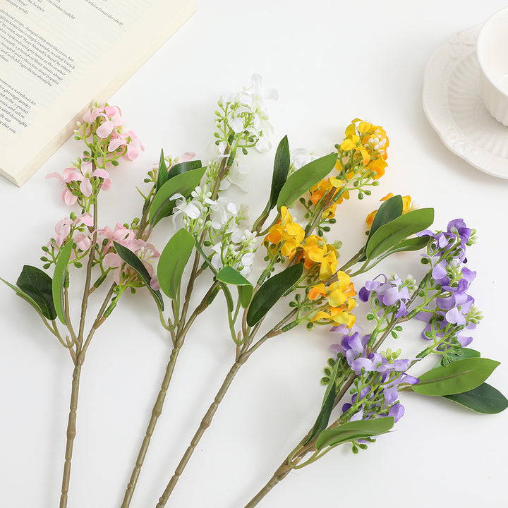 Künstlicher Blütenzweig mit leuchtenden Blüten Karnz