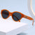 Damen Cat-Eye Sonnenbrille mit exotischem Design und robustem Rahmen Karnz