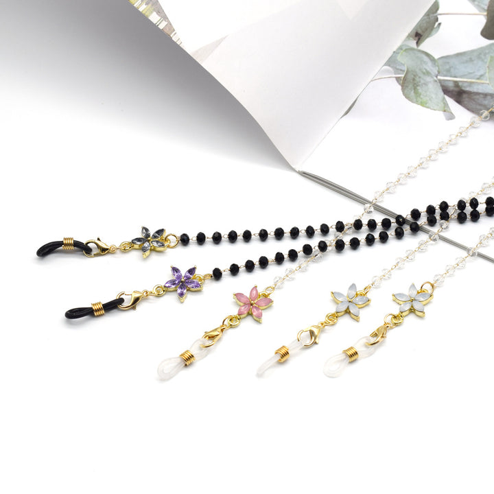 Eleganter mit Blumenakzenten verzierter Brillenketten Karnz