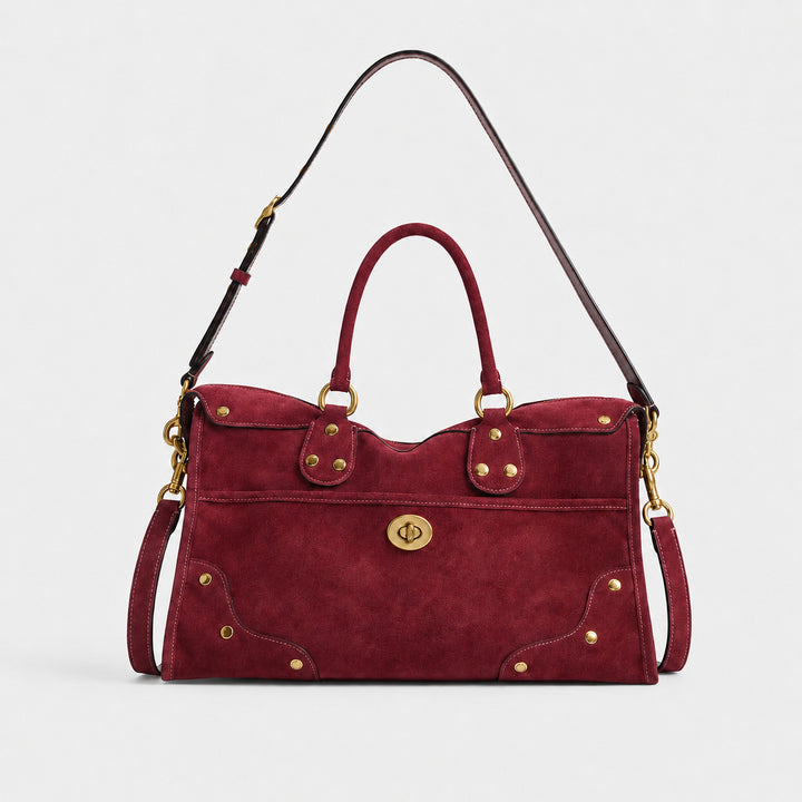 Elegante Wildlederhandtasche mit Messingakzenten