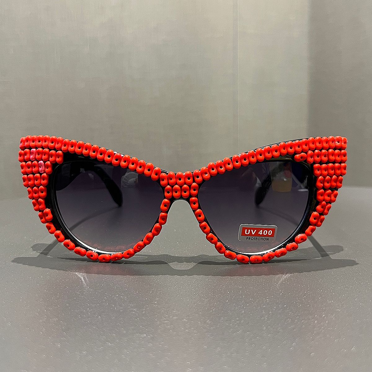 Damen Cat-Eye Sonnenbrille mit farblich akzentuiertem Rahmen Karnz