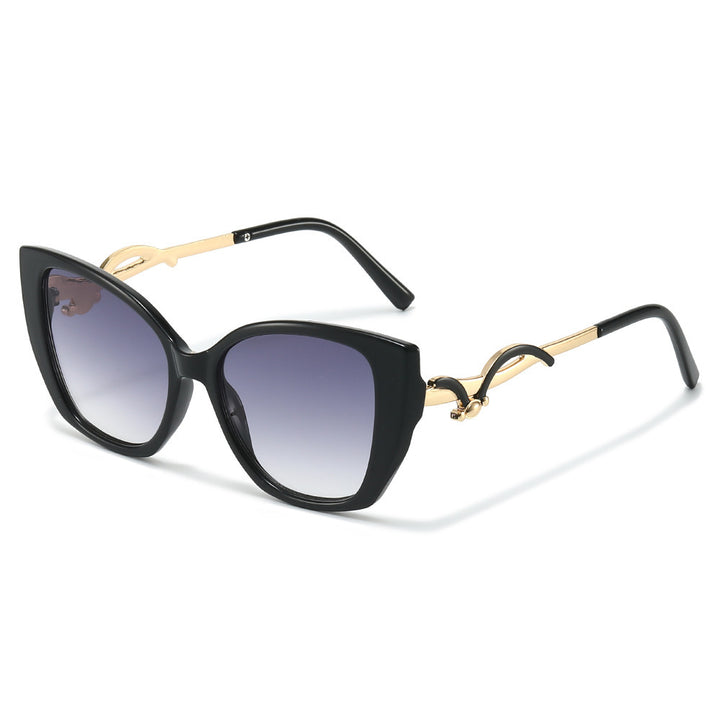 Übergroße Geometrische Katzenaugen-Sonnenbrille mit goldenen Akzenten Karnz