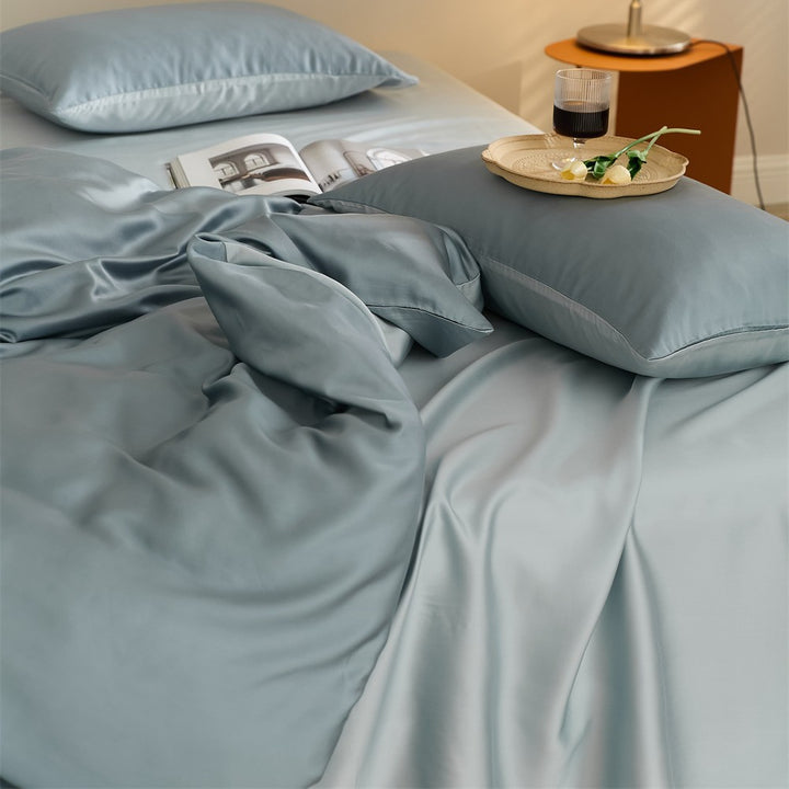 Wendbares Satin-Bettwäscheset mit seidig-glänzendem Griff und hautfreundlichem Baumwollmix