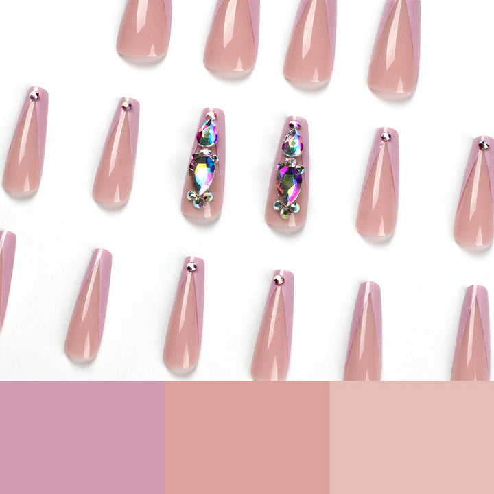 Kunstvolle Nagelverlängerungen mit Strass- und Blütenakzenten Karnz