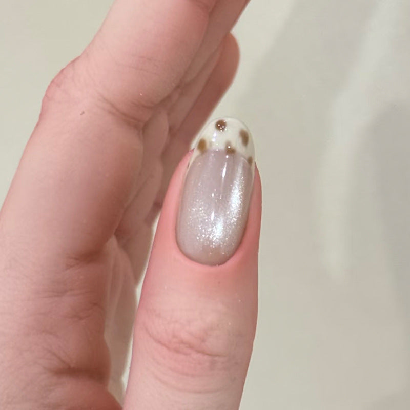 Künstlerisches Press-On-Nagelset mit glänzendem Finish und einzigartigen Mustern Karnz