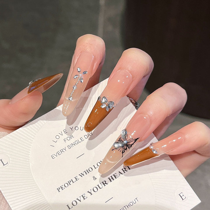 Künstlerische 3D Schmetterling und Edelstein Press-On Nagelverlängerungen Karnz