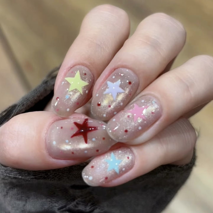 Künstlerisches Sterne-Design Press-On Nagelset