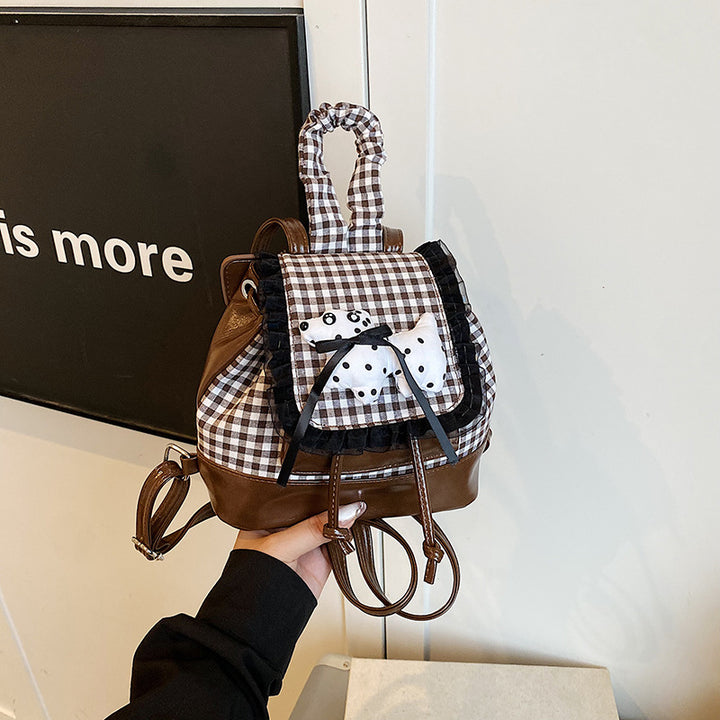 Verspielter Rucksack mit Karomuster und Tierapplikation Karnz