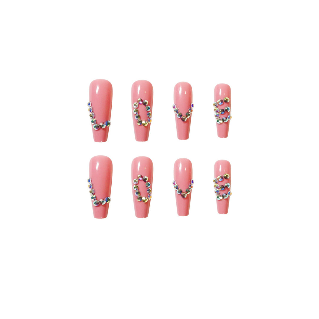 Künstliche Nagelverlängerungen mit eleganten Strassverzierungen Karnz