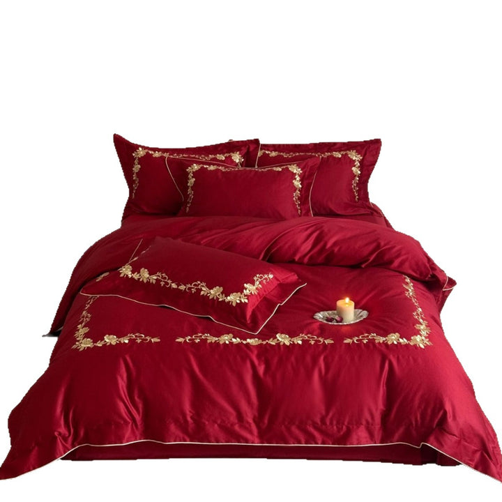 Luxuriöses Satin-Bettwäsche-Set mit floraler Goldstickerei und feiner Paspelierung