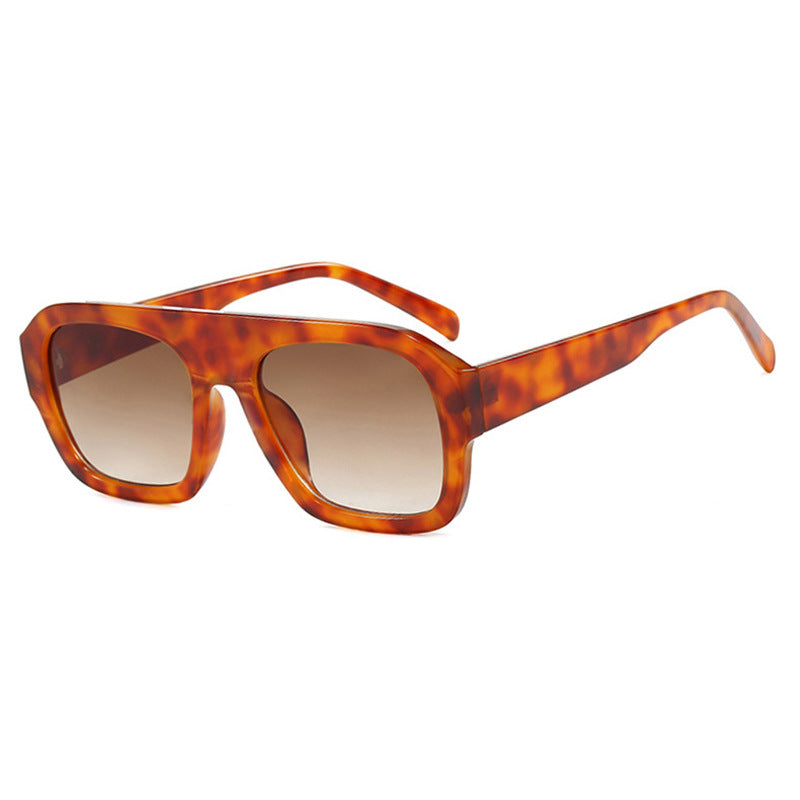 Damen modische Sonnenbrille mit robustem Rahmen und breiten Gläsern Karnz