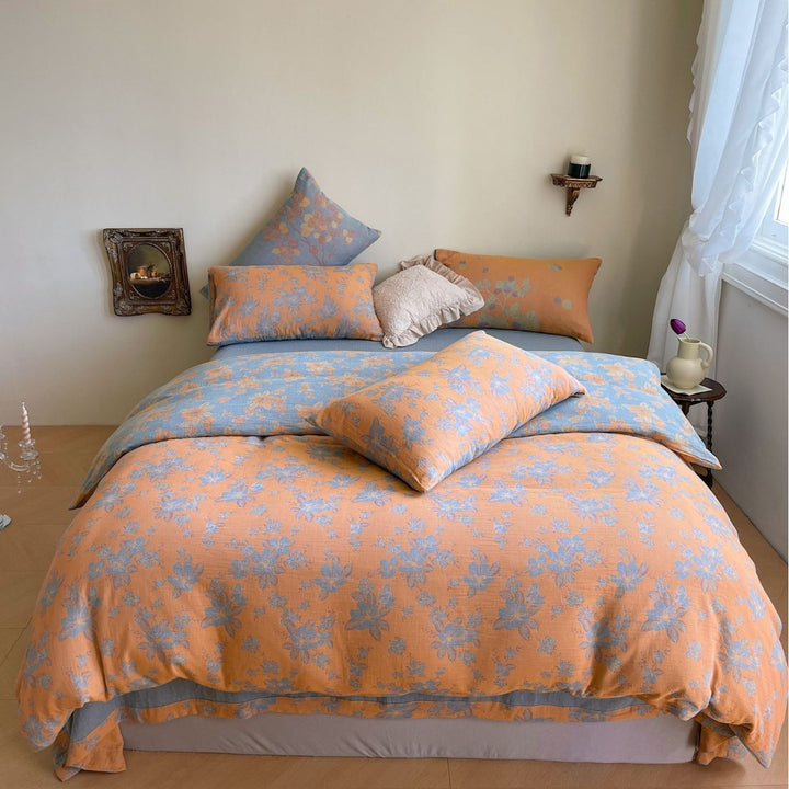 Wendbares Bettwäsche-Garnitur-Set aus Baumwoll-Leinen mit zartem Blumenprint und gesteppter Decke