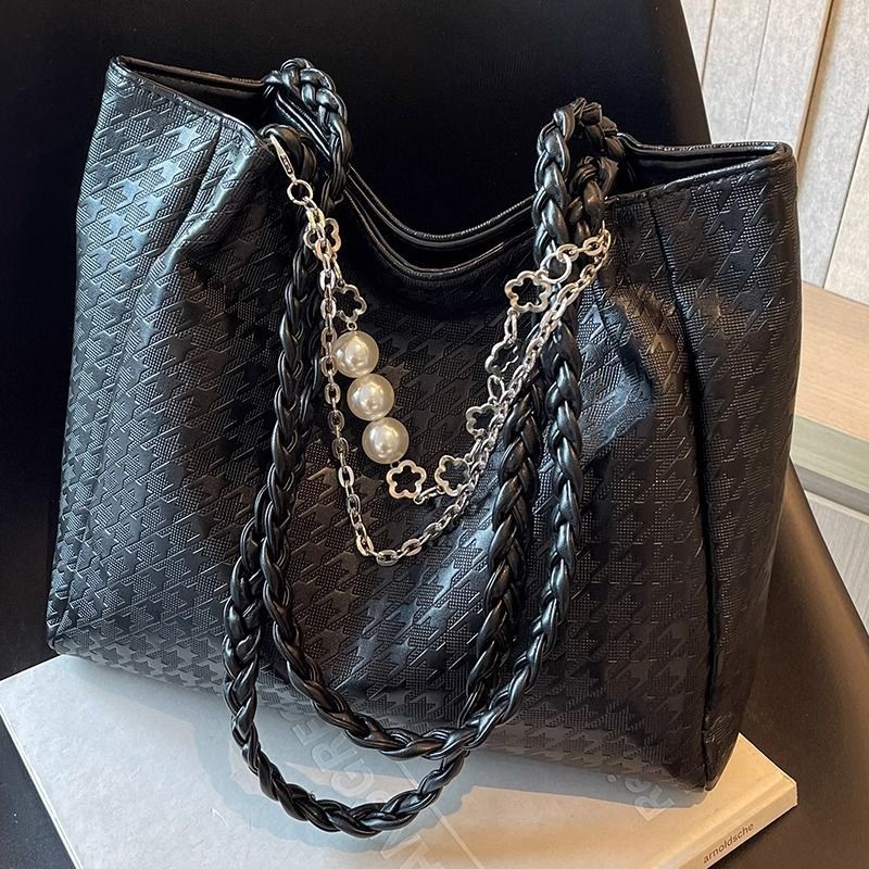 Luxuriöse strukturierte Handtasche Karnz