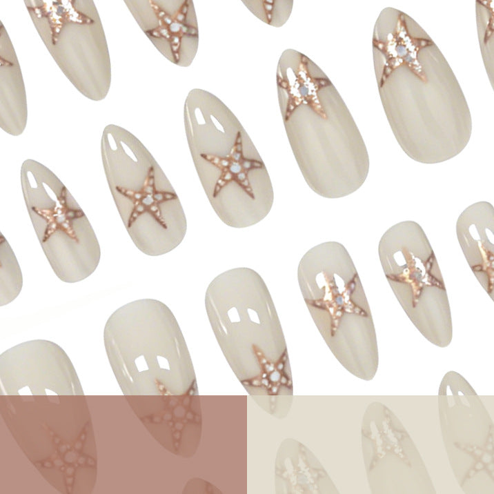 Elegante Sternenfisch-verzierte Nagelkunst Karnz