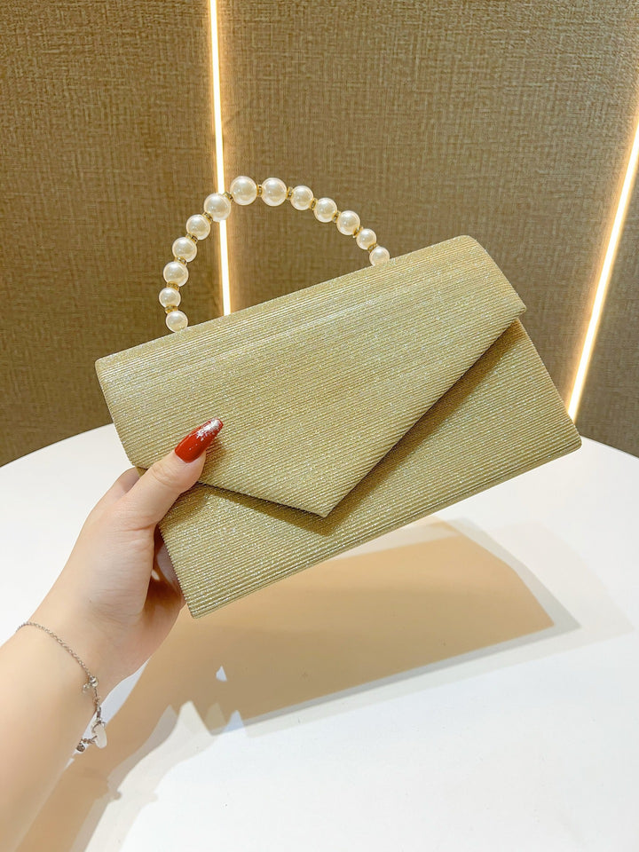 Elegante Abendtasche mit Perlengriff