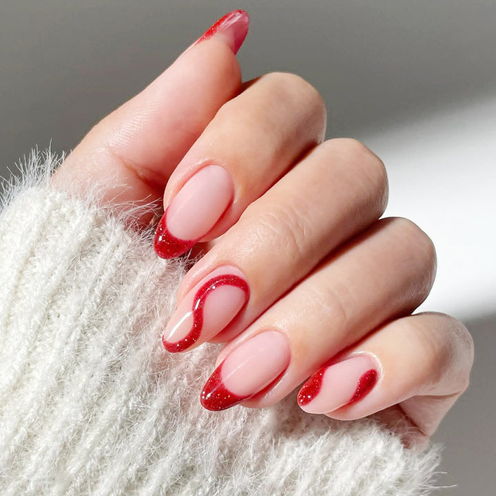 Kunstnagelset mit modernen Spitzen und Glitzerakzenten Karnz