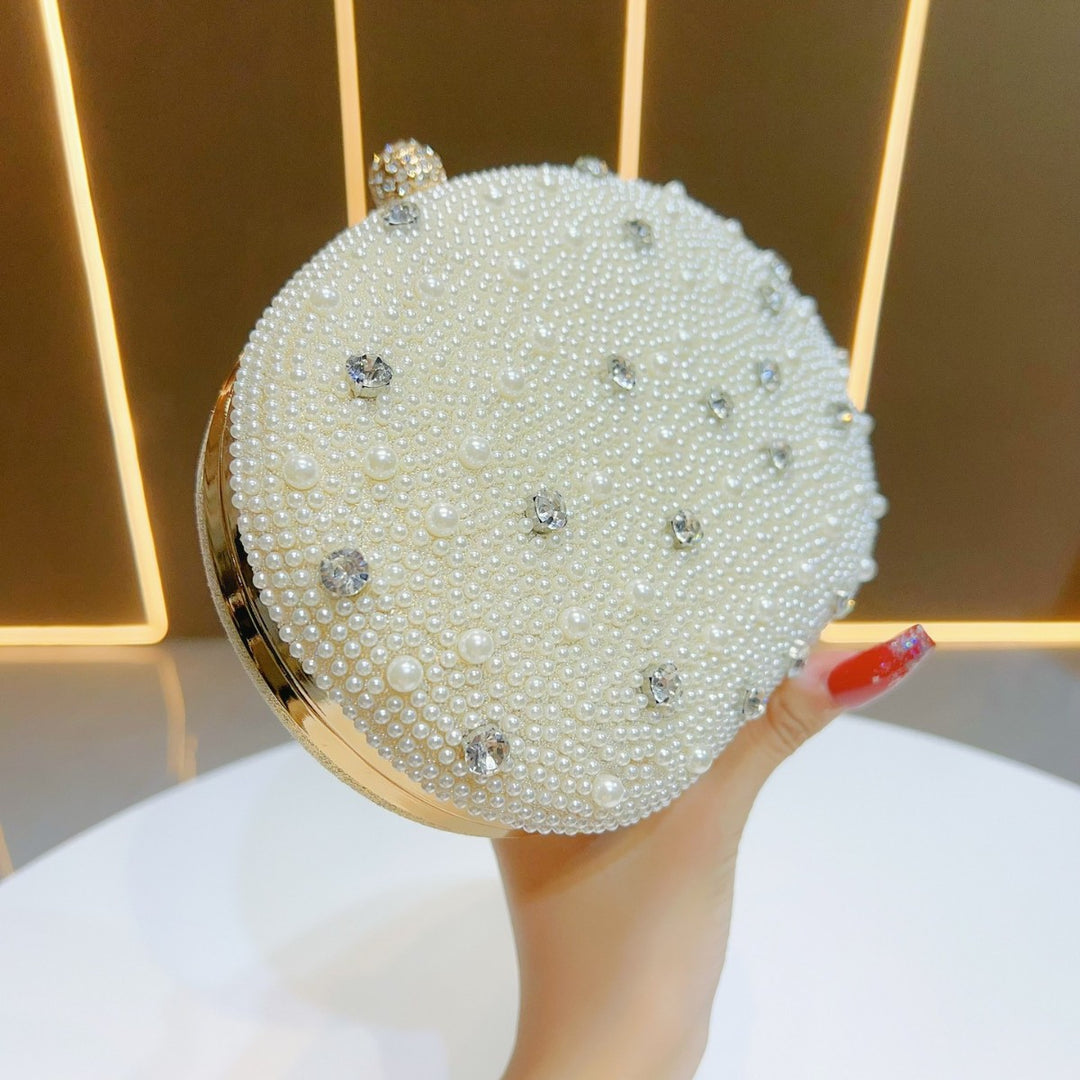Perlenverzierte Abend-Clutch