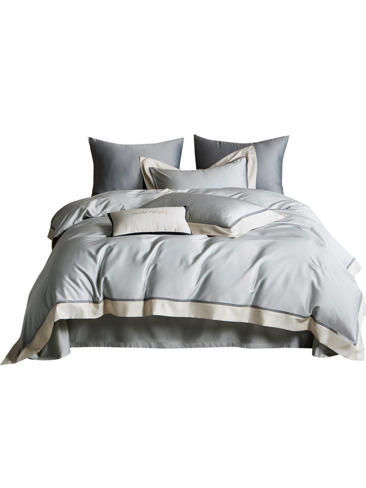 Elegantes Satin-Duvetbezug-Set mit kontrastierender Saumblende und feiner Biese
