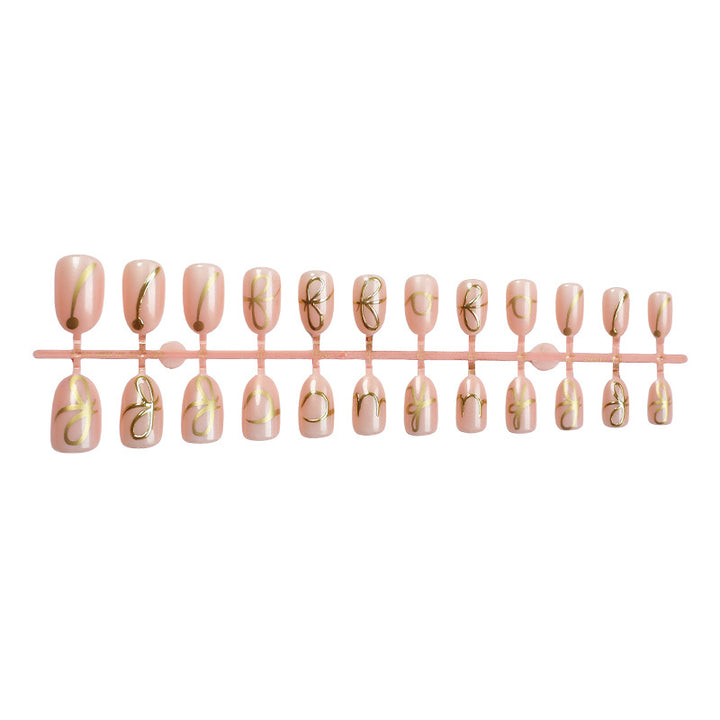 Elegantes Press-On Nail Art Set mit stilvollen goldenen Akzenten Karnz