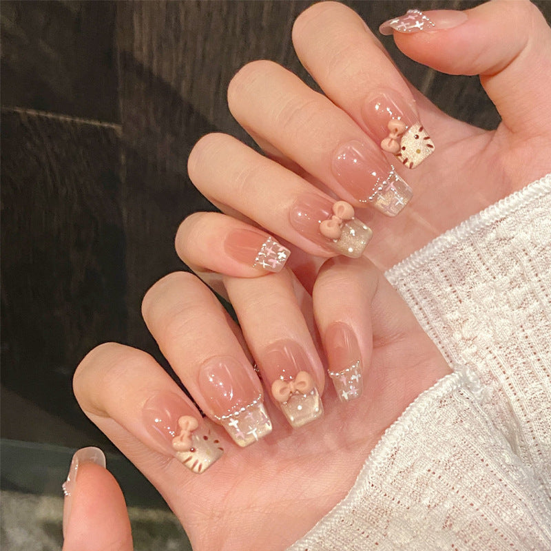 Dekorativer Press-On Nagelset mit Glitter und Strassakzenten Karnz