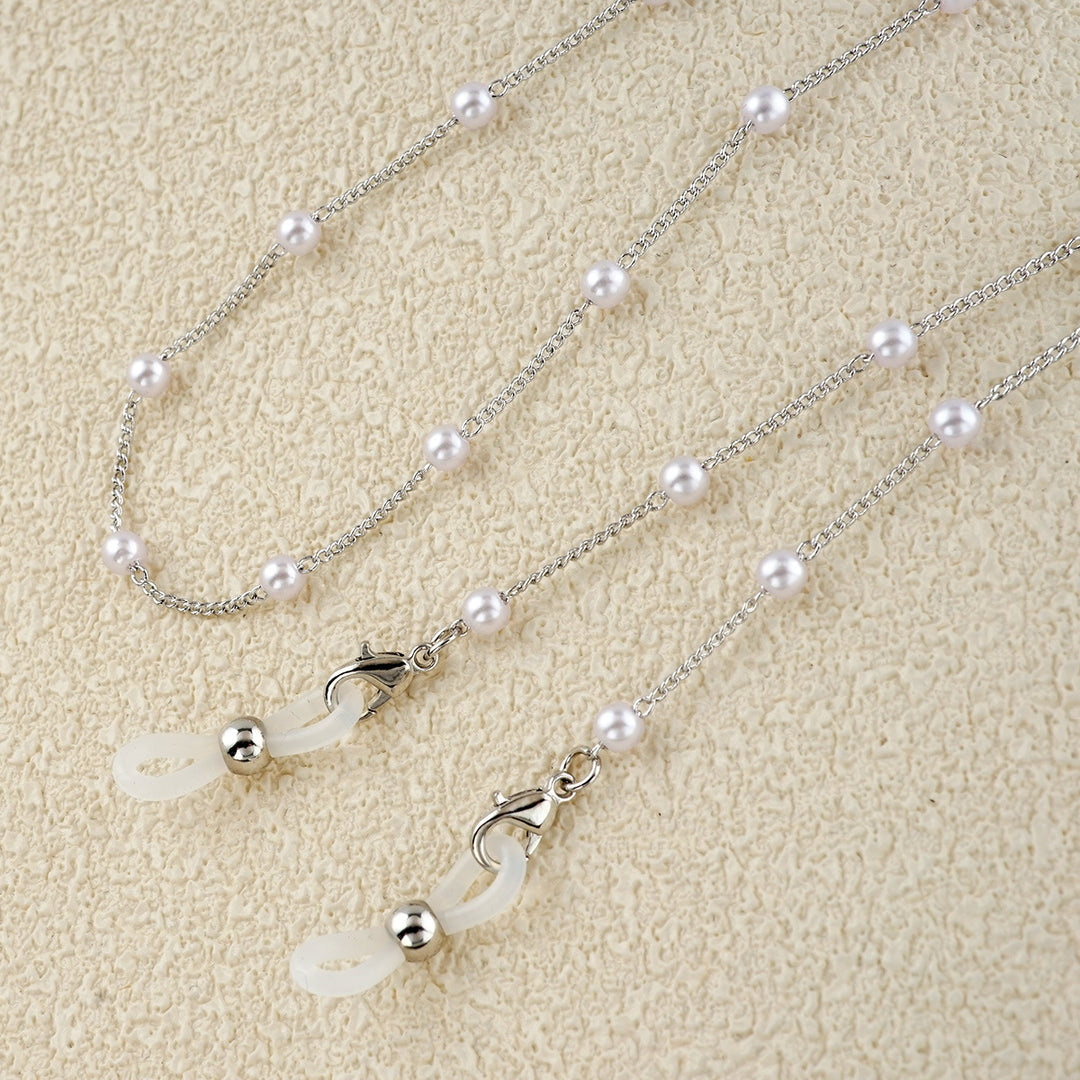 Eleganter mit Perlen verzierter Brillenhalter Karnz