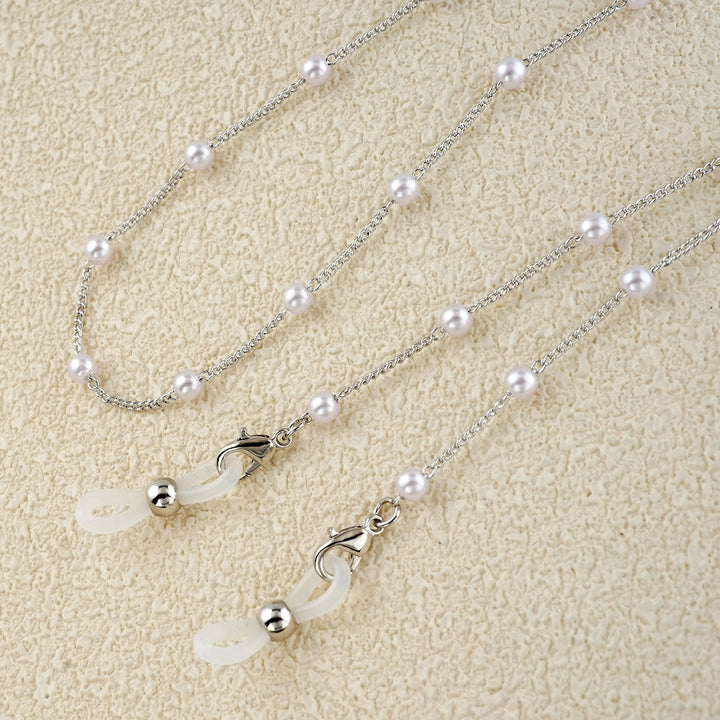 Eleganter mit Perlen verzierter Brillenhalter Karnz
